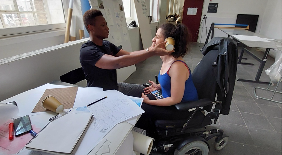 UIA Student Academy, Royal Danish Academy 2023. Two students, one in a weelchair are working together i an inclusion workshop